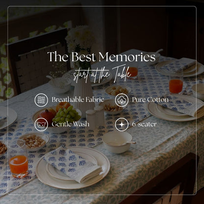 Table setting with blue and white patterned tablecloth and napkin, text overlay about tableware features.