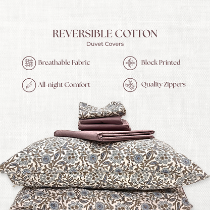 Reversible cotton duvet covers with floral patterns on a light background