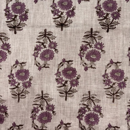 Floral pattern with purple flowers on a grey background