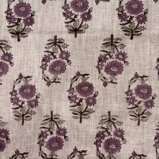 Floral pattern with purple flowers on a grey background