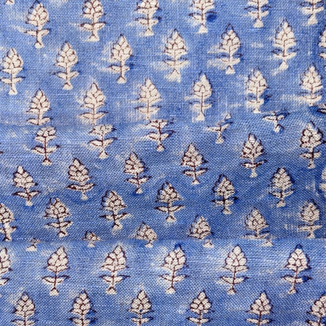 Blue fabric with white floral pattern