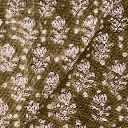 Fabric with floral pattern on a brown background