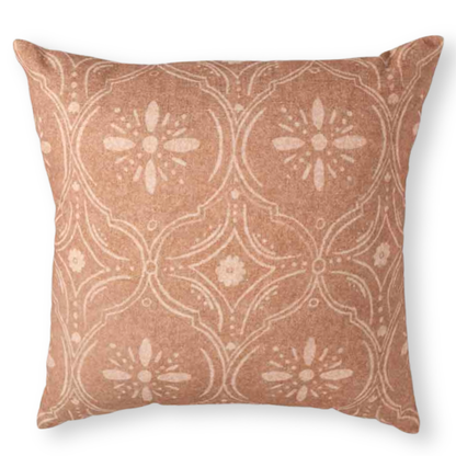 Decorative pillow with a floral pattern on a white background