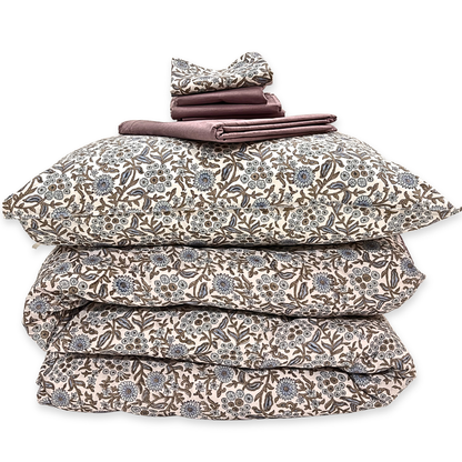 Floral patterned bedding set on a white background