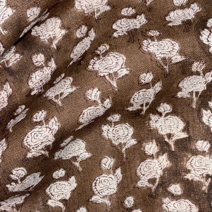 Brown fabric with white floral pattern