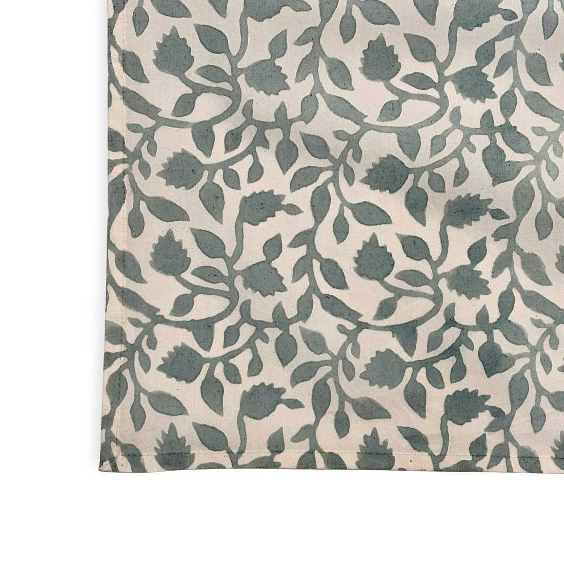 Tablecloth with a green leaf pattern on a white background