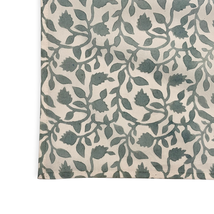 Tablecloth with a green leaf pattern on a white background