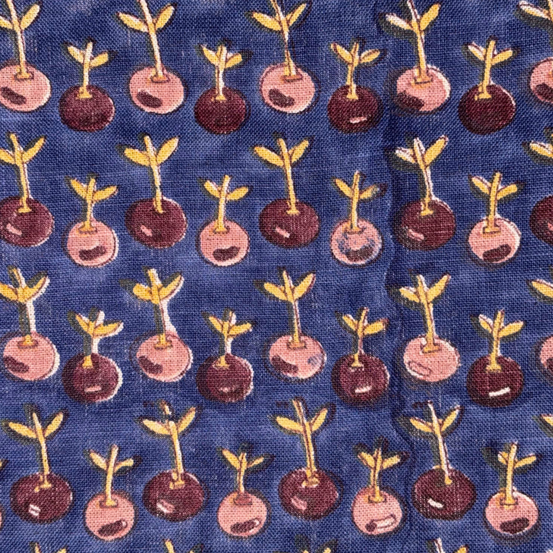 Pattern of small plants in pots on a blue background