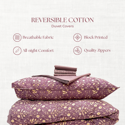 Reversible cotton duvet covers with floral pattern on a white background