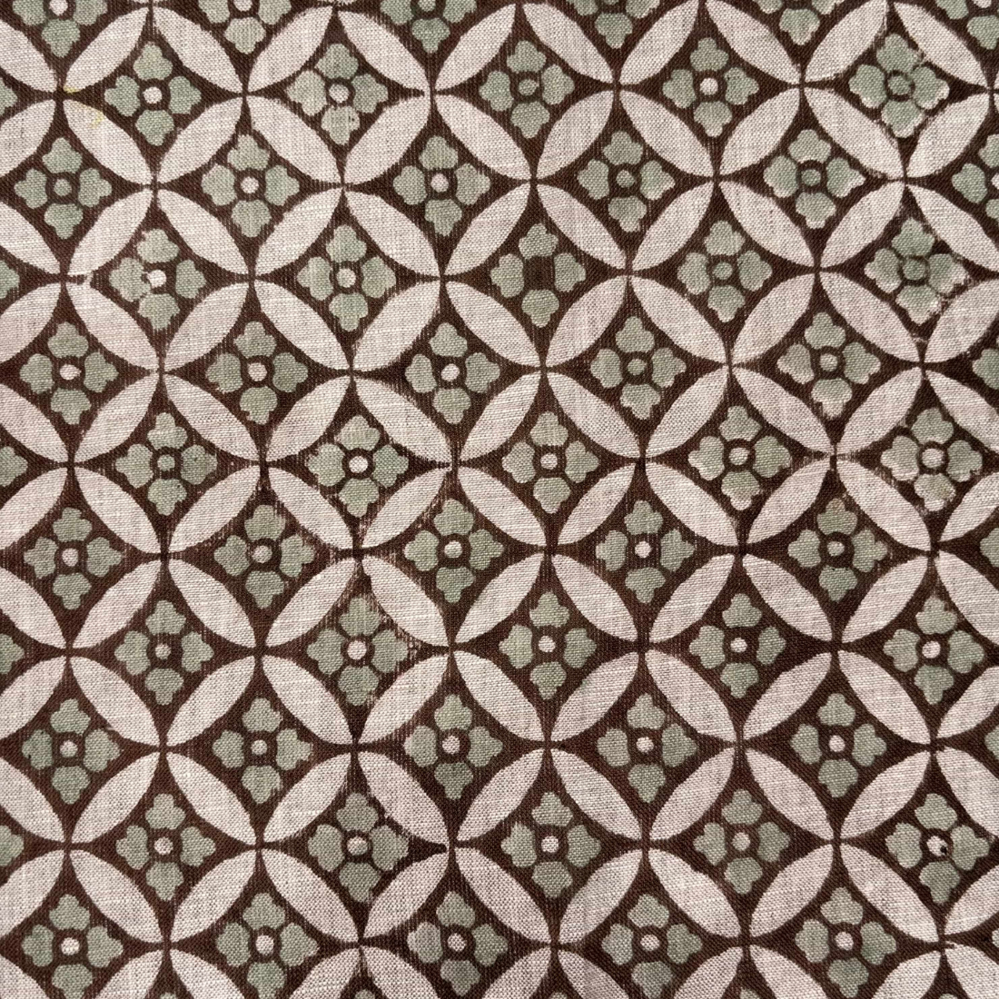 Patterned fabric with a geometric design on a grey background