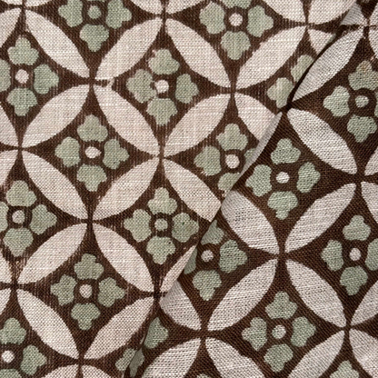 Patterned fabric with geometric design on a grey background