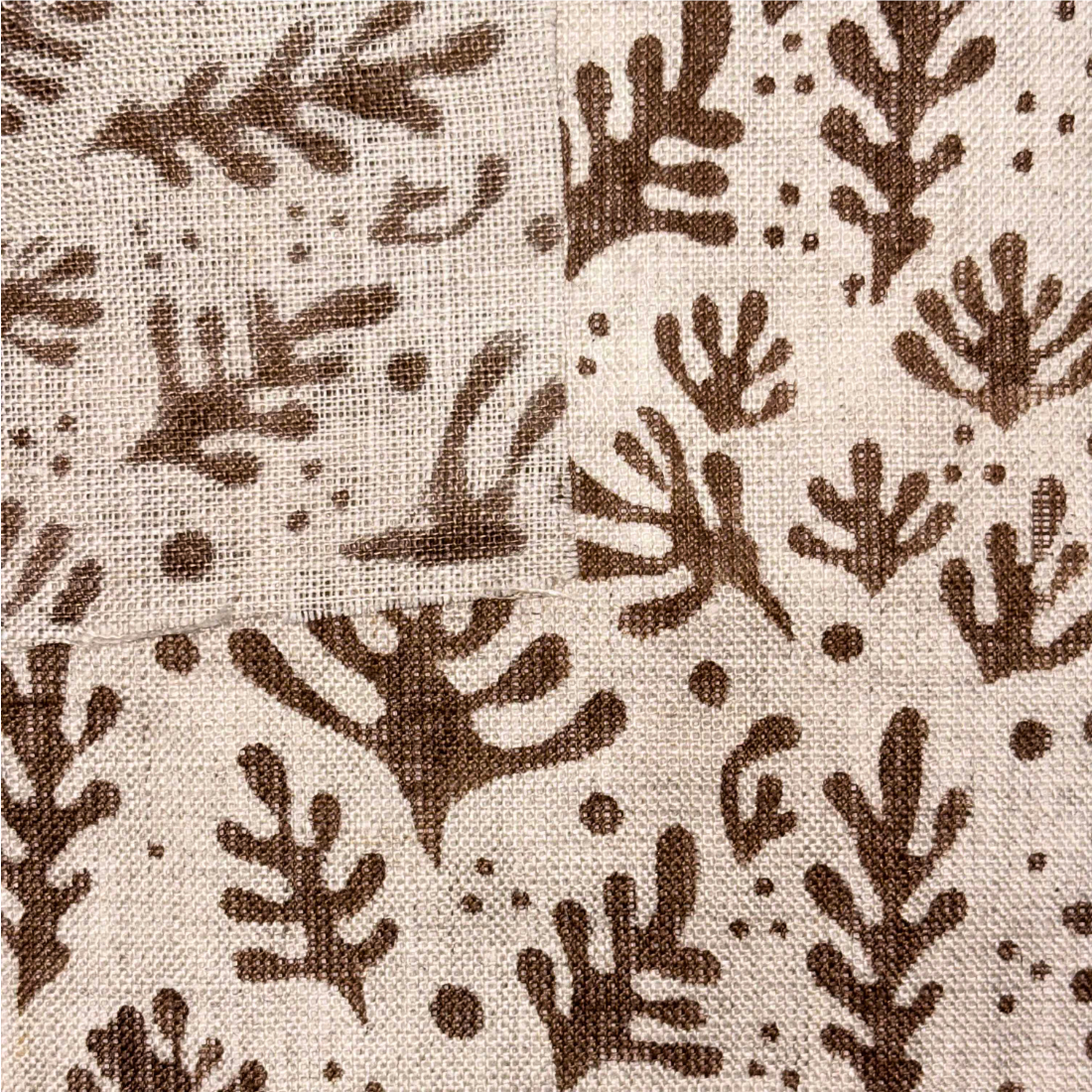Textile with brown leaf pattern on beige background