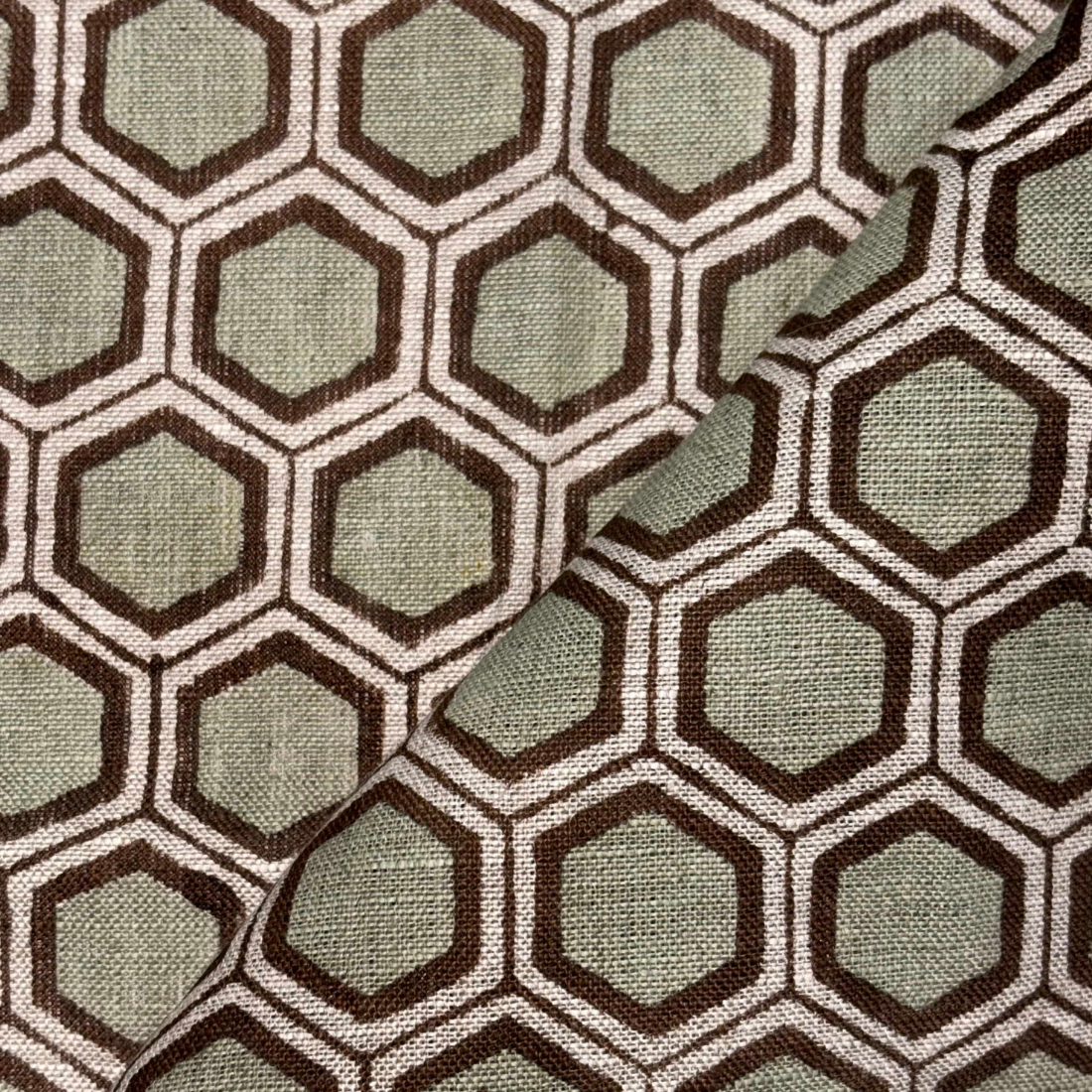 Hexagonal pattern fabric with brown and green colors