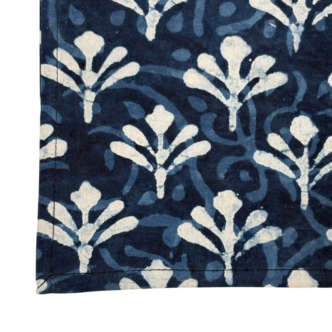 Navy blue napkin with white floral pattern