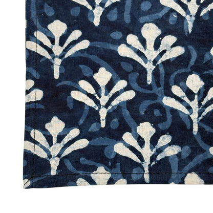 Navy blue napkin with white floral pattern