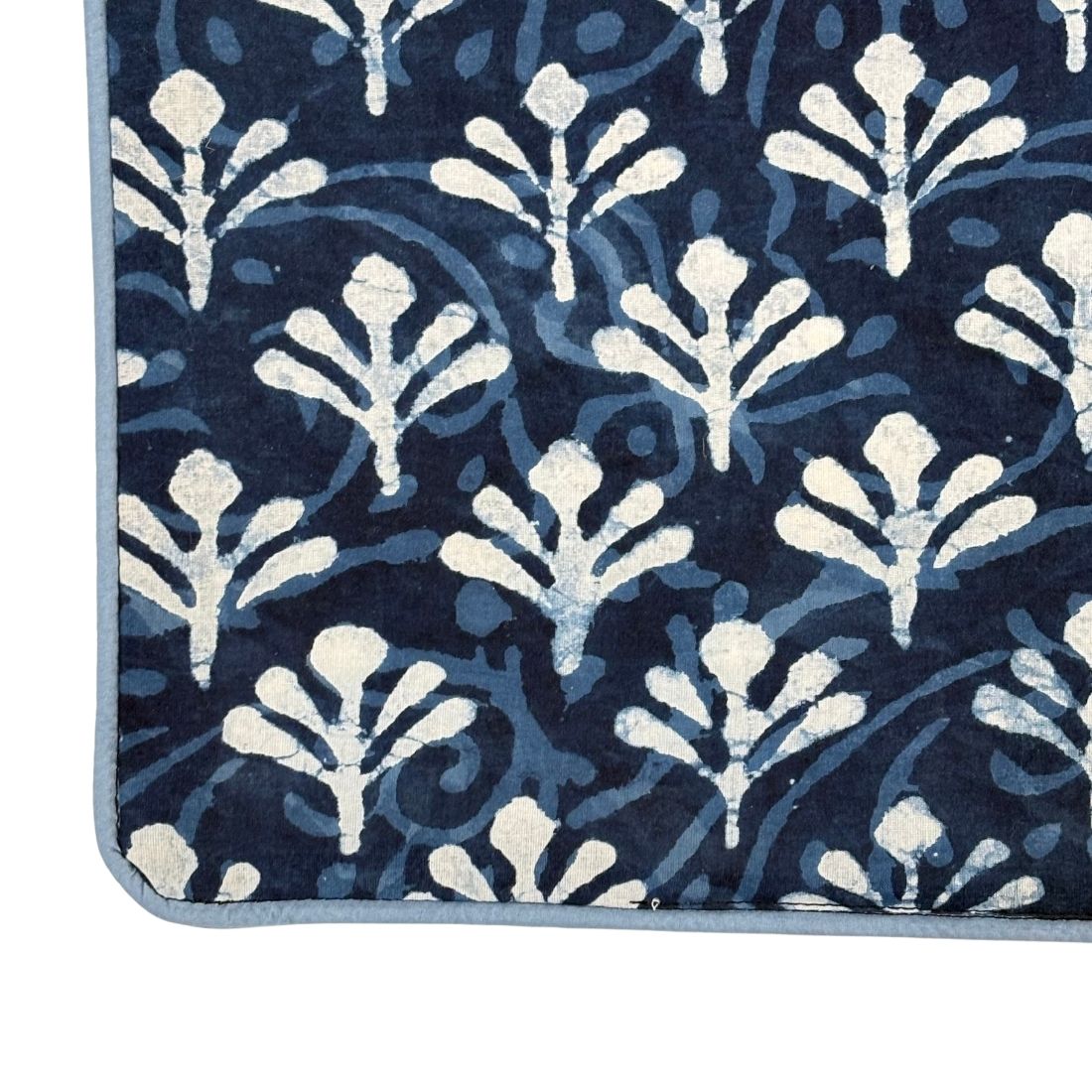 Navy blue table runner with white floral pattern