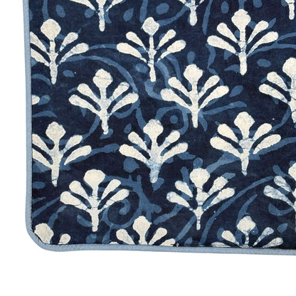 Navy blue table runner with white floral pattern