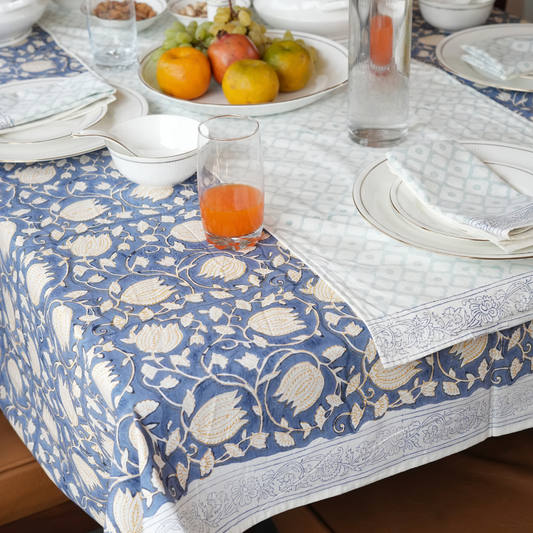 Table setting with a blue floral table linen set