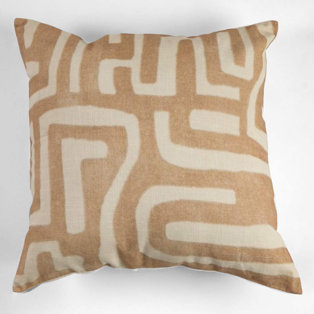 Decorative pillow with geometric pattern on a white background