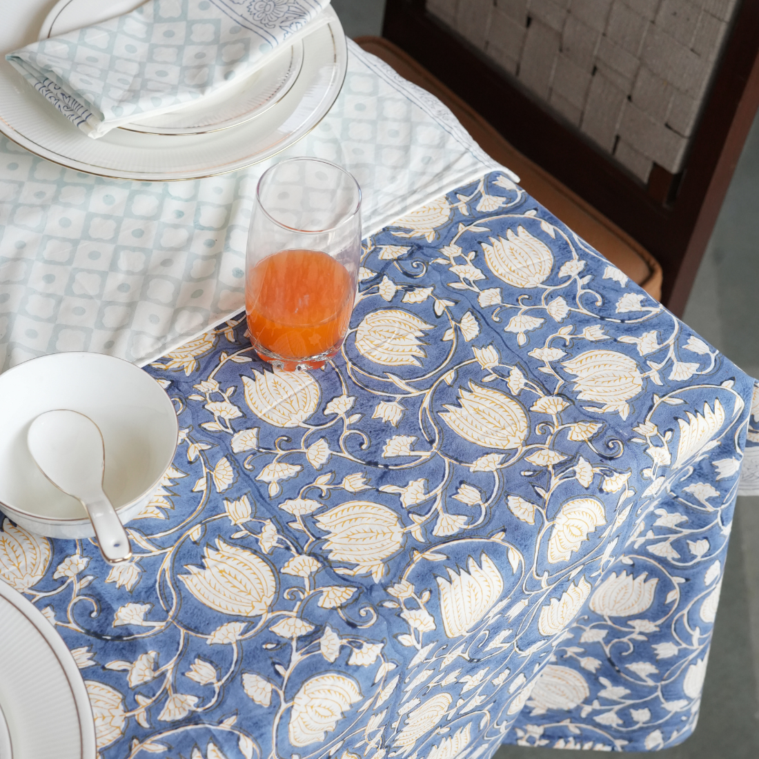 Floral-patterned table linen set on a dining table