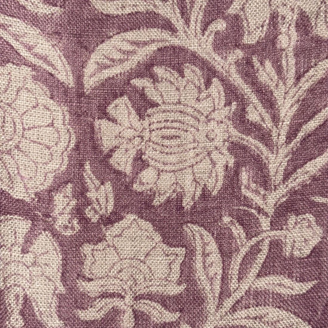 Close-up of floral patterned fabric with purple and grey colors