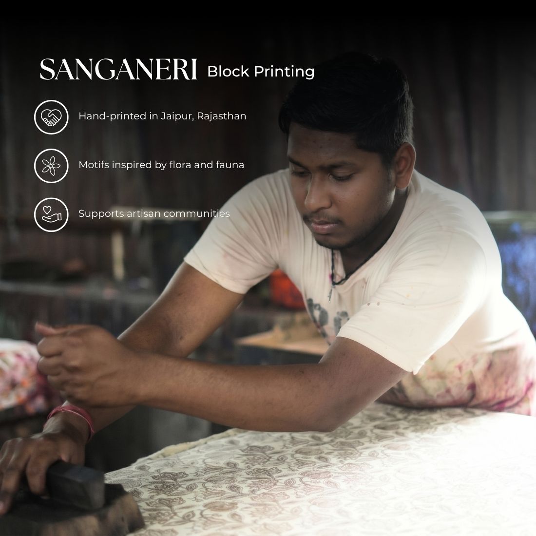 Man working with Sanganeri block printing techniques in Jaipur, Rajasthan.
