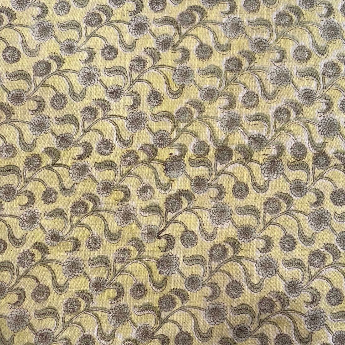 Patterned fabric with floral design on a grey background