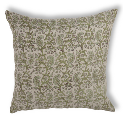 Decorative pillow with green floral pattern on a white background