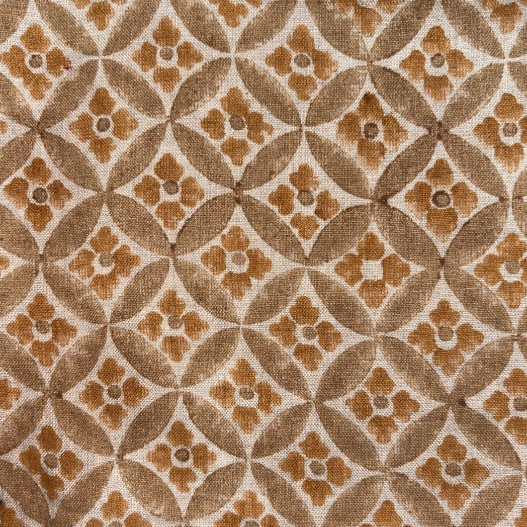 Patterned fabric with brown and beige geometric design