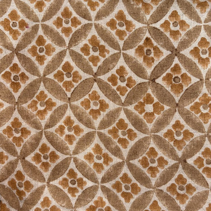 Patterned fabric with brown and beige geometric design