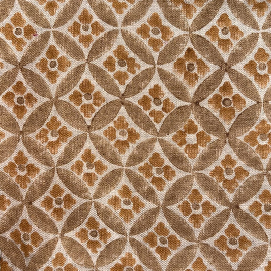 Patterned fabric with brown and beige geometric design