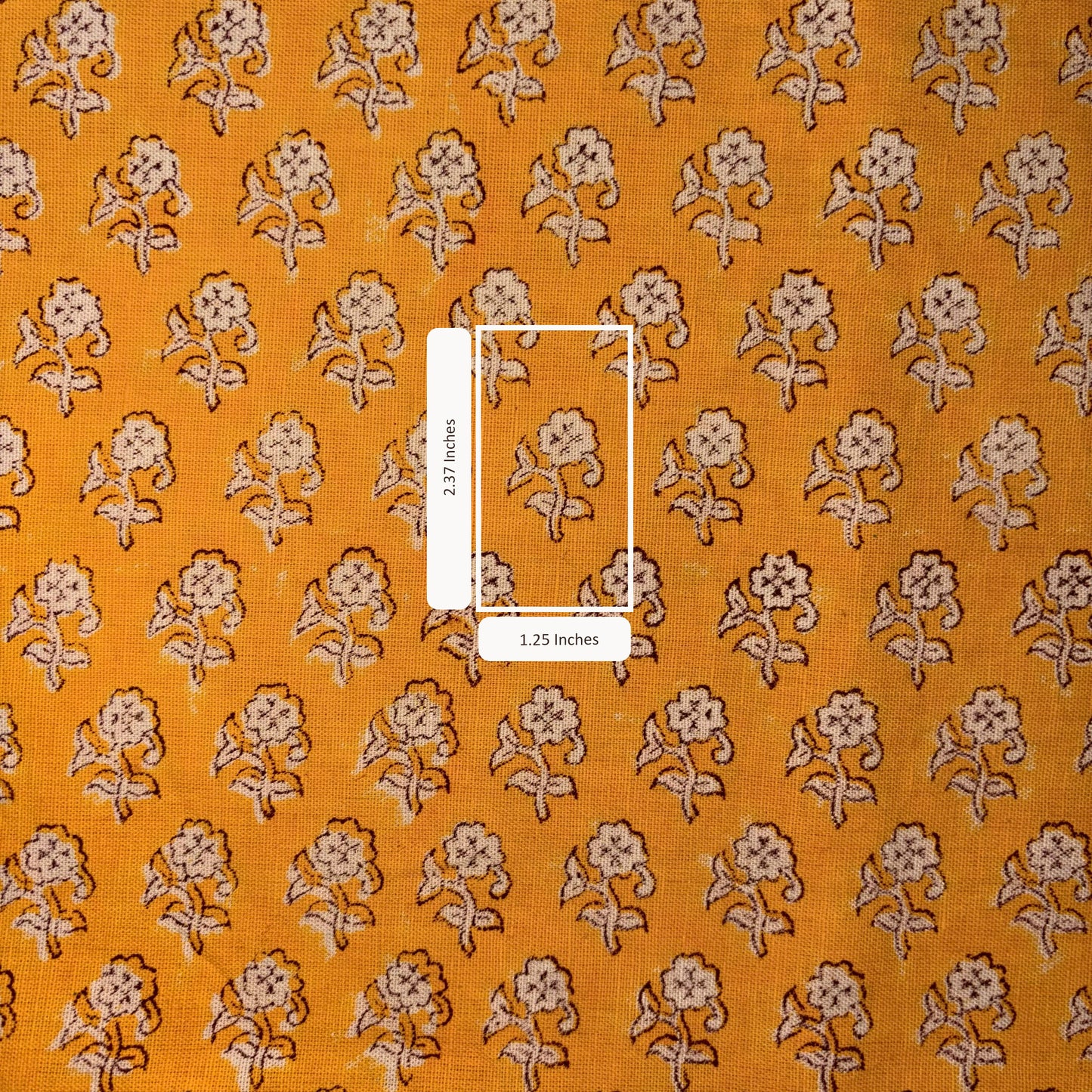 Floral pattern on fabric with measurement overlay