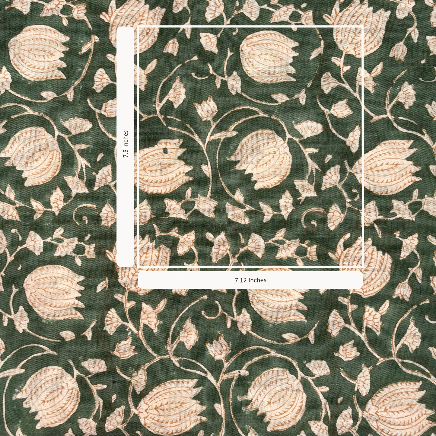 Floral patterned fabric with a scale bar on a green background