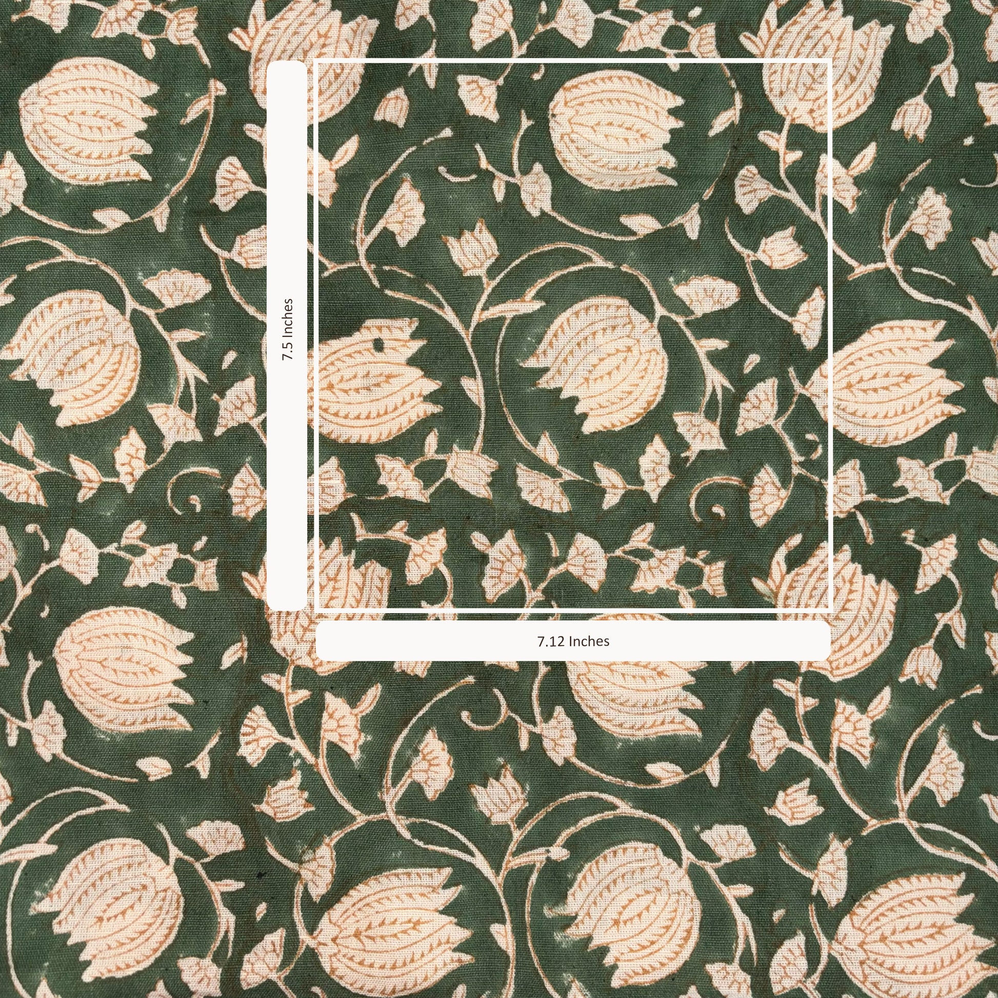 Floral patterned fabric with a scale bar on a green background