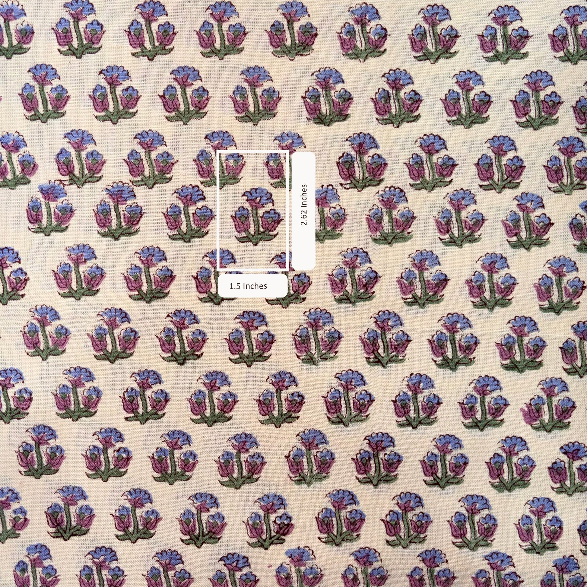 Patterned fabric with blue and purple floral design on a beige background