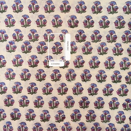 Patterned fabric with blue and purple floral design on a beige background