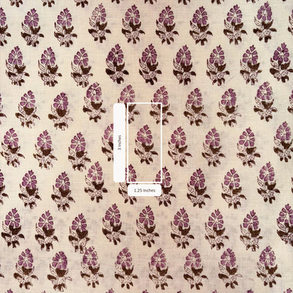Patterned fabric with pink and brown design on a beige background