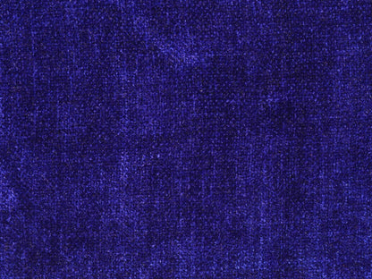Close-up of a textured blue fabric surface