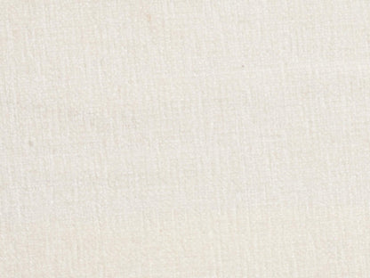 Close-up of a textured white fabric surface