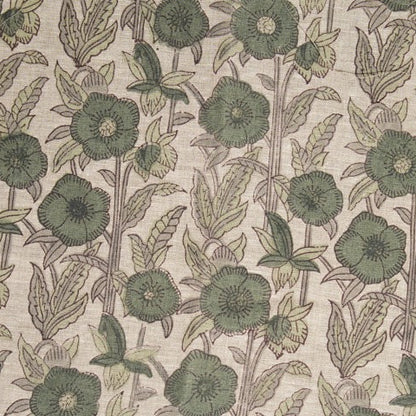 Patterned fabric with green flowers and leaves on a grey  background