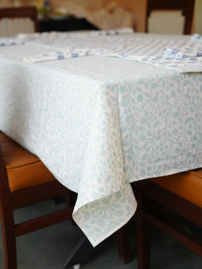 Tablecloth with floral pattern on a wooden table