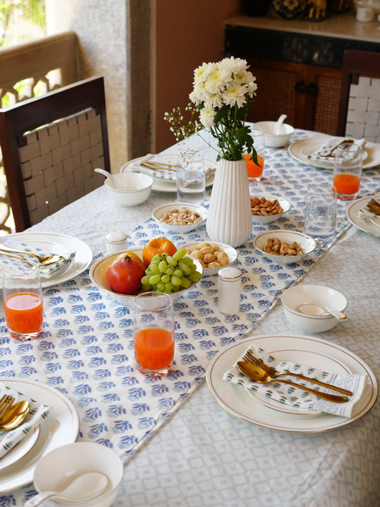 Dining table set with tablecloth, table runner and napkins
