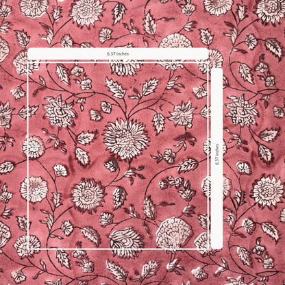 Floral patterned fabric with measurements on a pink background