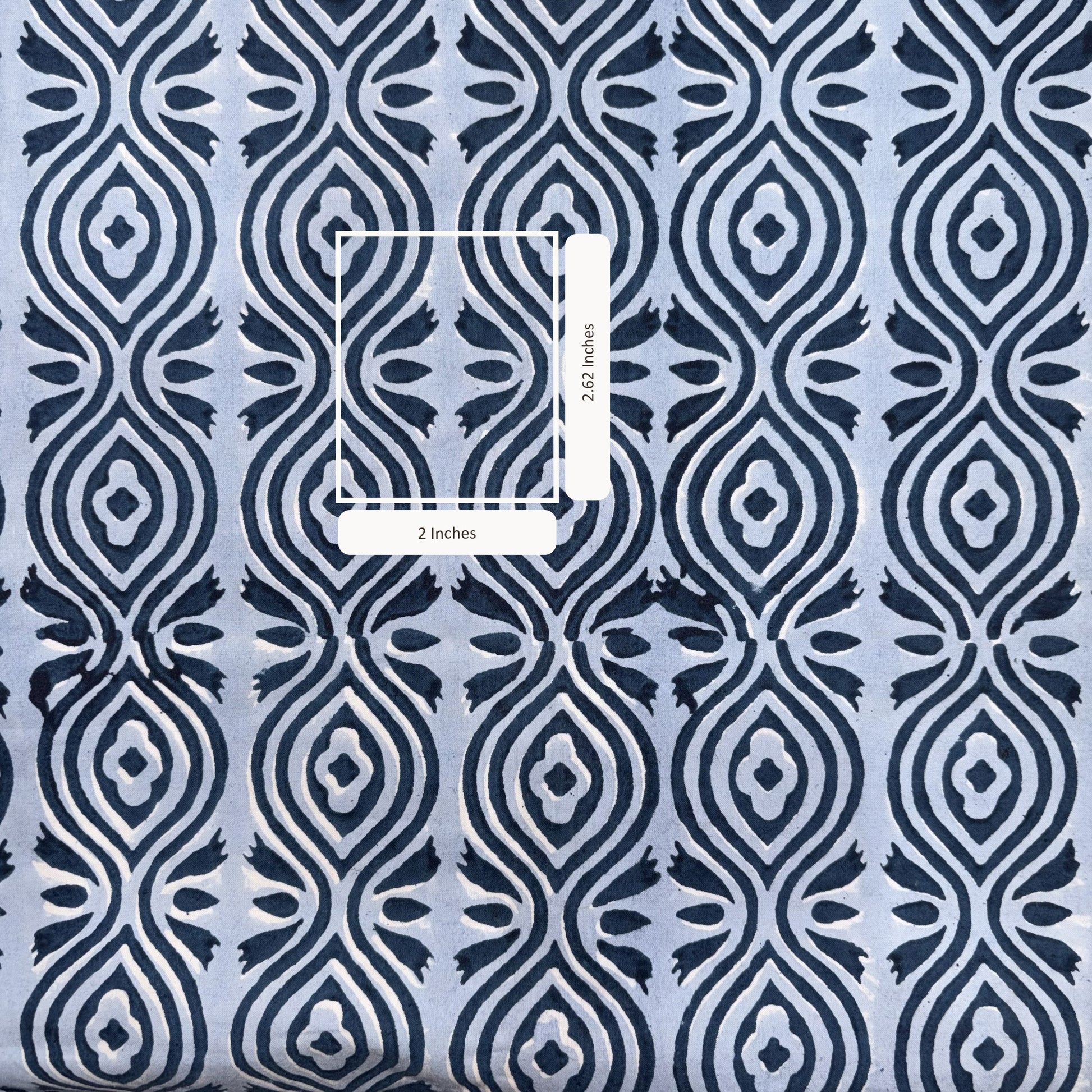 Patterned fabric with a blue and white geometric design, measurement overlay.
