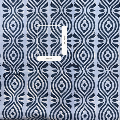 Patterned fabric with a blue and white geometric design, measurement overlay.