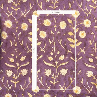 Floral patterned fabric with a measurement overlay on a purple background