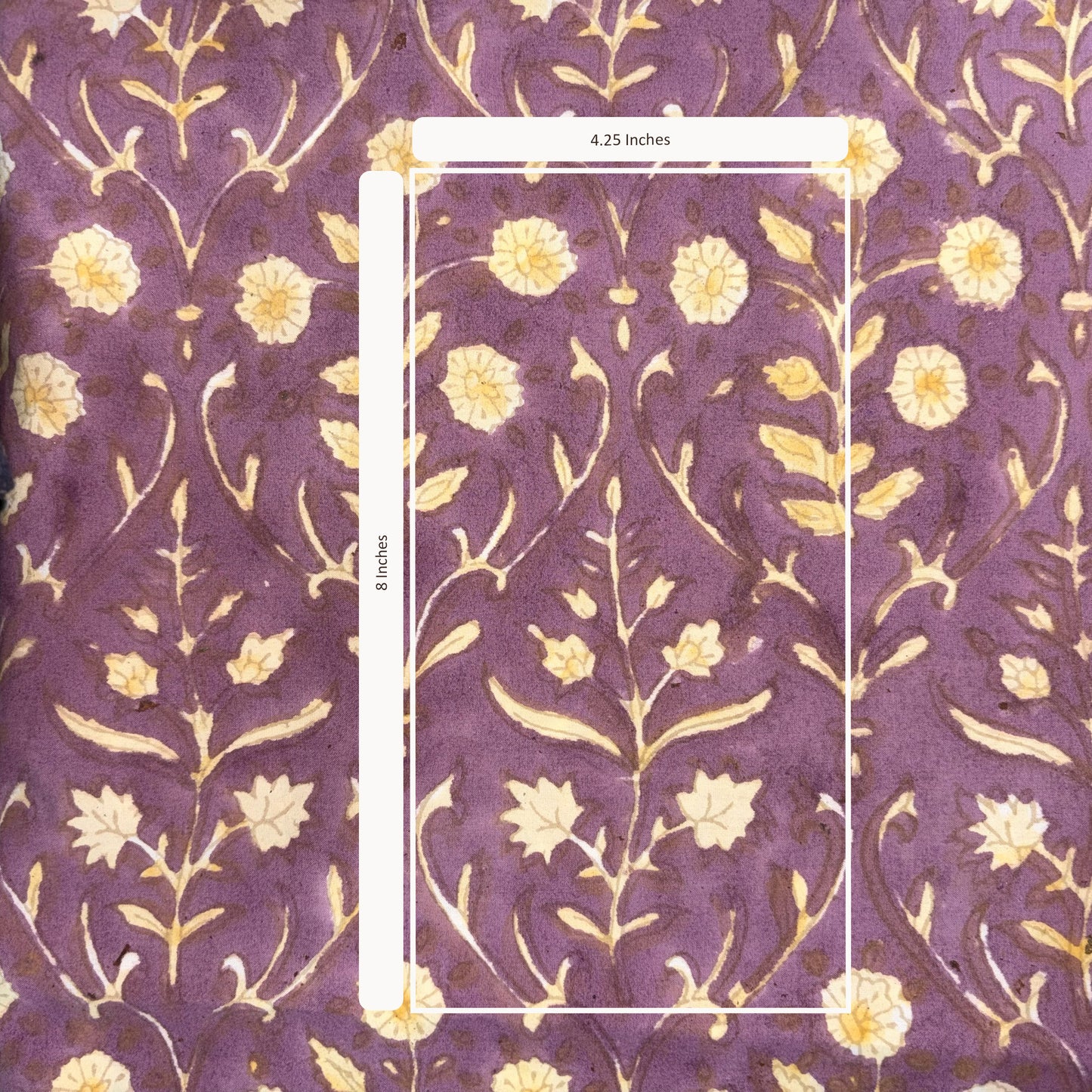 Floral patterned fabric with a measurement overlay on a purple background
