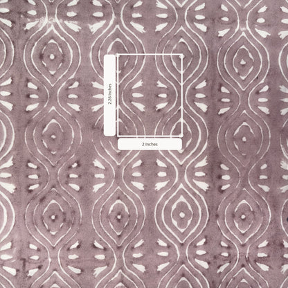 Patterned fabric with a measurement overlay on a pink background