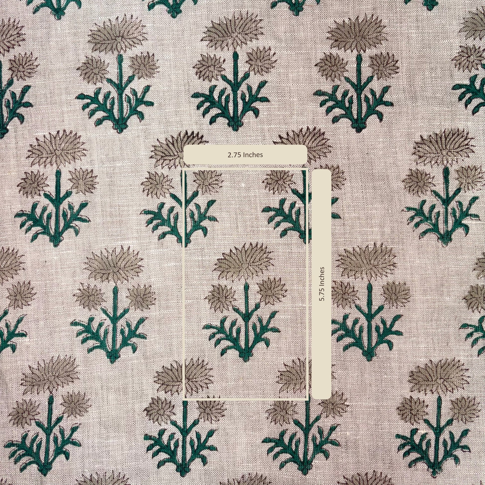 Fabric with a floral pattern and a measuring stick indicating 2.75 inches.