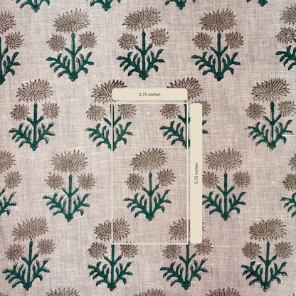 Fabric with a floral pattern and a measuring stick indicating 2.75 inches.